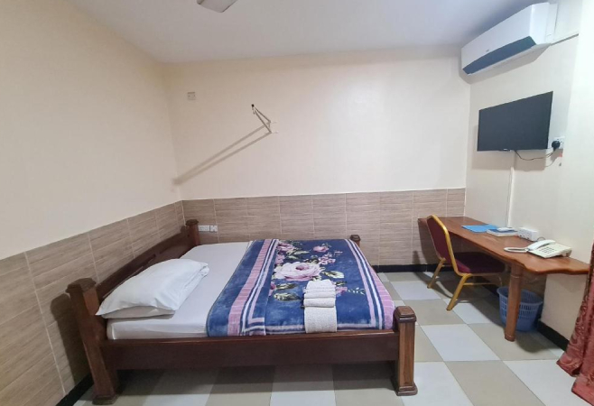 Dolphin Hotel in Tanga offers comfortable rooms with private bathrooms, air-conditioning, and modern amenities