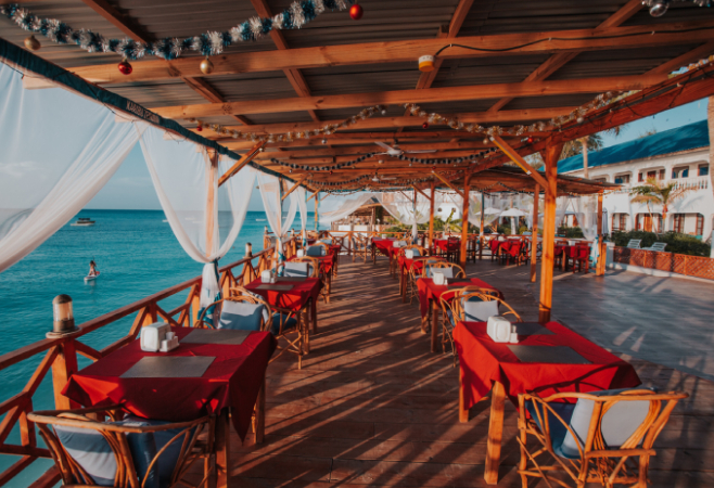 The Nungwi boasts a variety of dining options, from local eateries serving fresh seafood to international restaurants offering diverse culinary delights. The Nungwi boasts a variety of dining options, from local eateries serving fresh seafood to international restaurants offering diverse culinary delights.