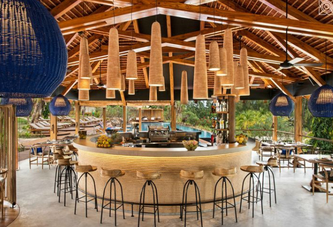 The restaurant offers a variety of seafood dishes and cocktails, complemented by stunning sunset views over the Indian Ocean The restaurant offers a variety of seafood dishes and cocktails, complemented by stunning sunset views over the Indian Ocean