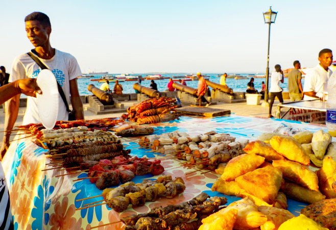 Zanzibar's cuisine is  a vibrant mix of Swahili, Indian, Arab, and Portuguese influences , resulting in a unique culinary experience